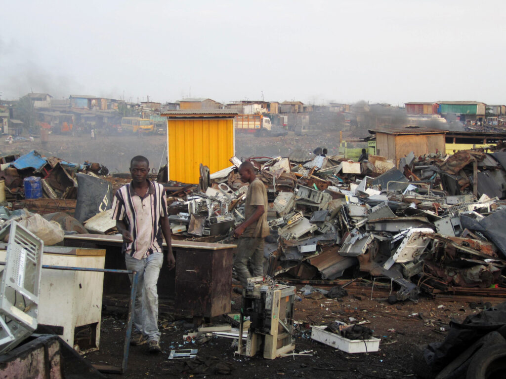 Ghanaians working in Agbogbloshie, a suburb of Accra, Ghana, 2011