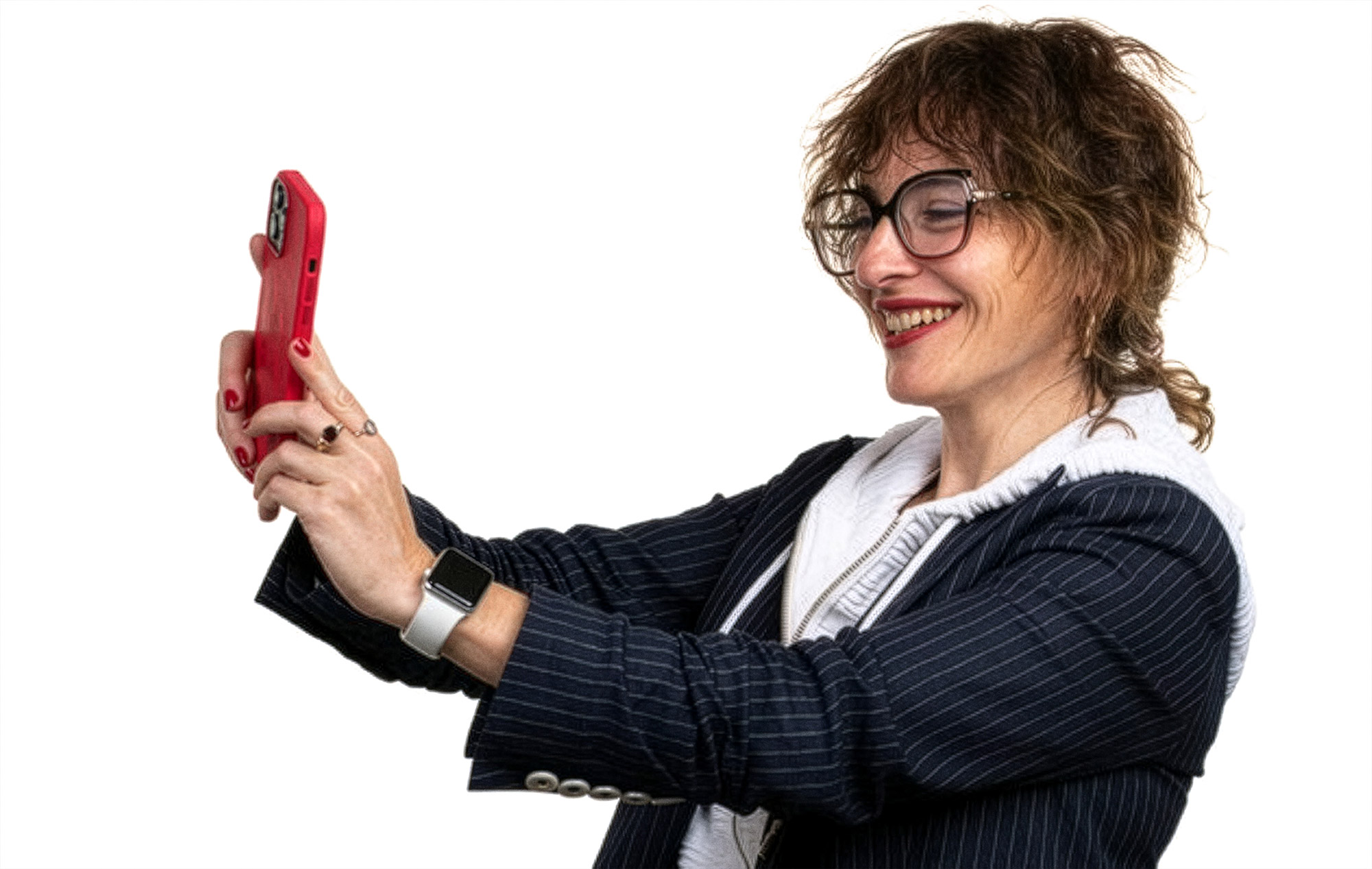 A person in a hoodie and blazer taking a selfie with a smartphone