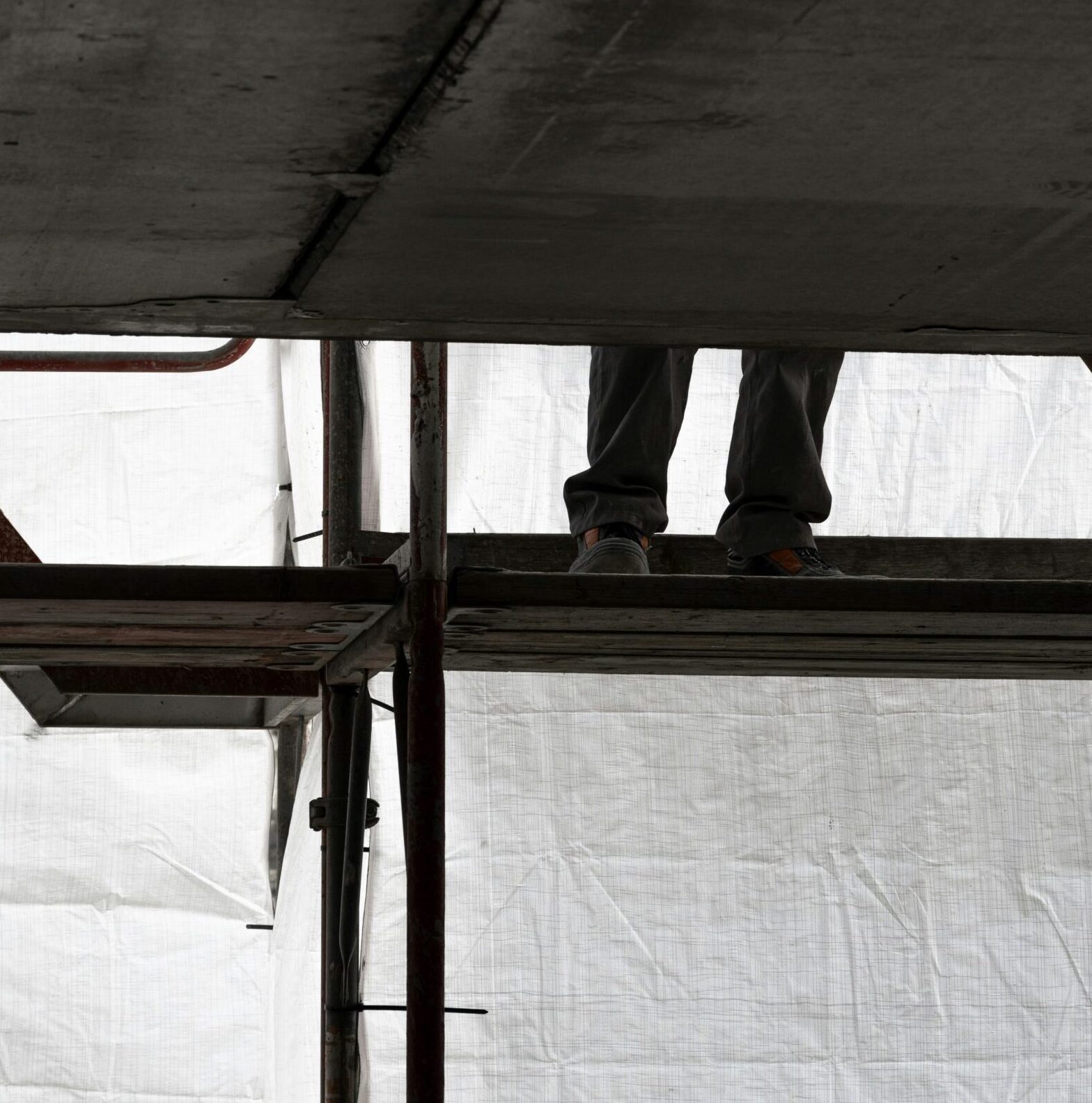 silhouette of feet on platform