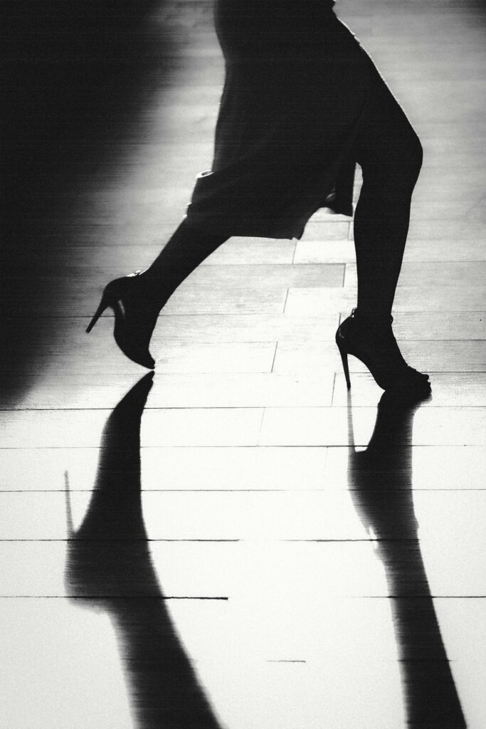 silhouette of high-heeled walker