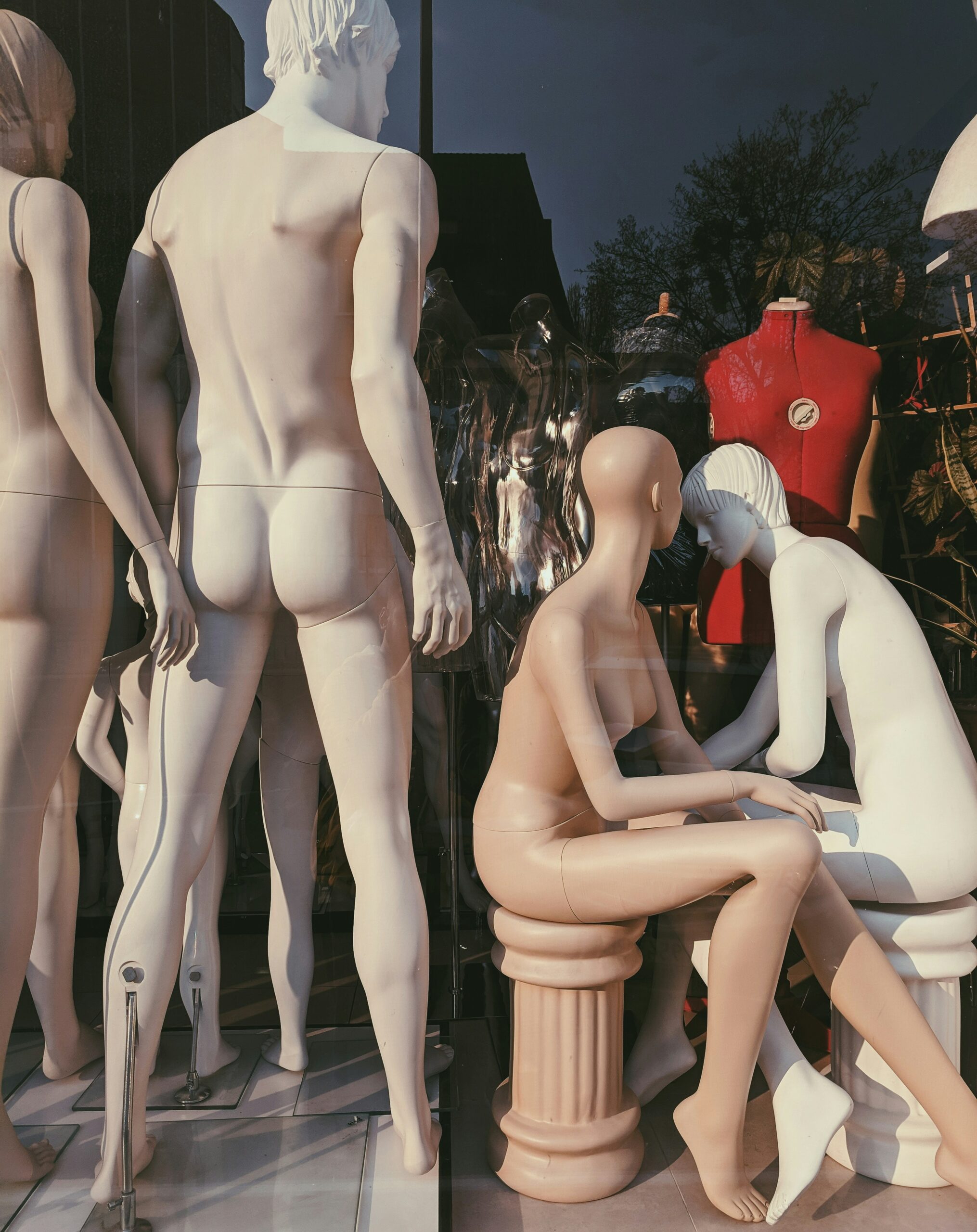 a gathering of undressed mannequins