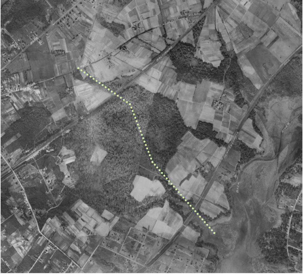 arial view of land with dotted line marking possible route